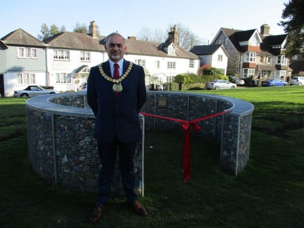 The Town Mayor standing next to the Rock Snake